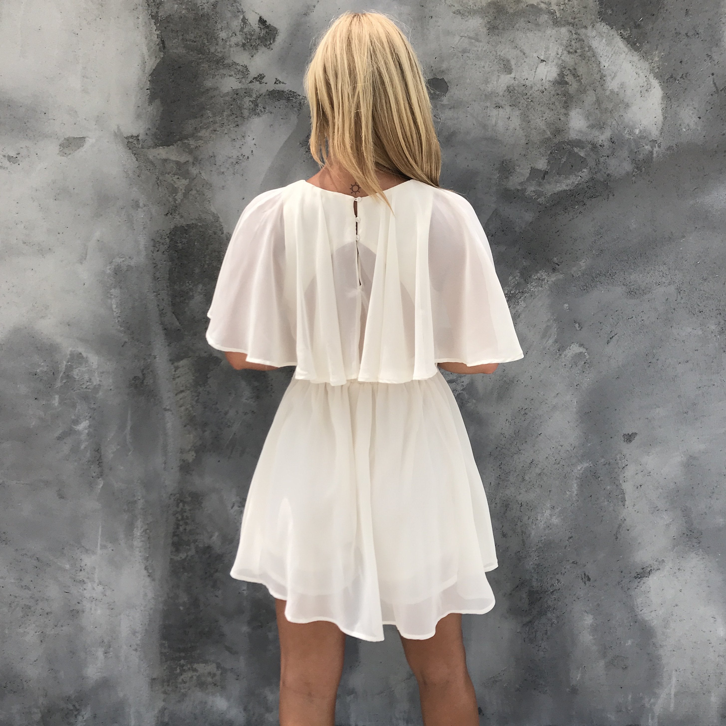 Ruffle Frenzy Cream Romper - Dainty Hooligan